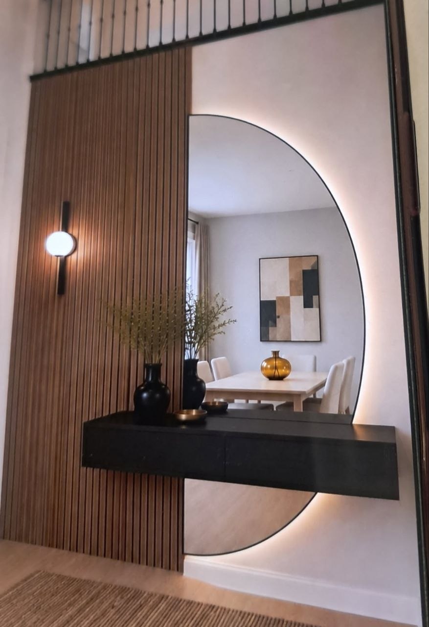 Custom entry accent wall with large mirror